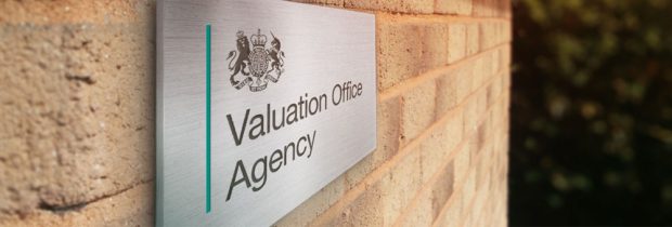 An external sign with the crest of the Valuation Office Agency.