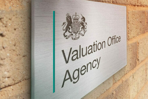 An external sign with the crest of the Valuation Office Agency.
