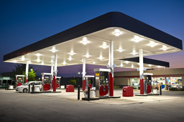 Petrol station forecourt at night